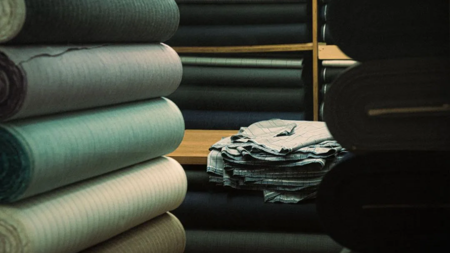 “Various stretch fabrics and textiles used in industrial uniform production