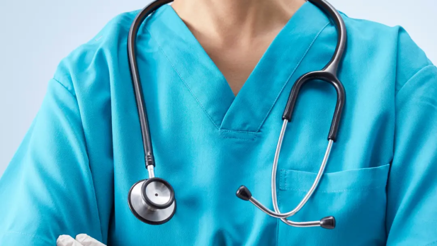 Healthcare professionals wearing custom medical scrubs designed for comfort, professional appearance, and healthcare facility branding.
