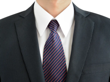 Step-by-step guide showing a student tying a school uniform tie, with instructions for achieving a neat and properly fitted knot.