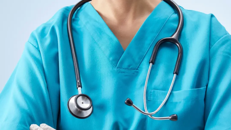 Healthcare professionals wearing custom medical scrubs designed for comfort, professional appearance, and healthcare facility branding.